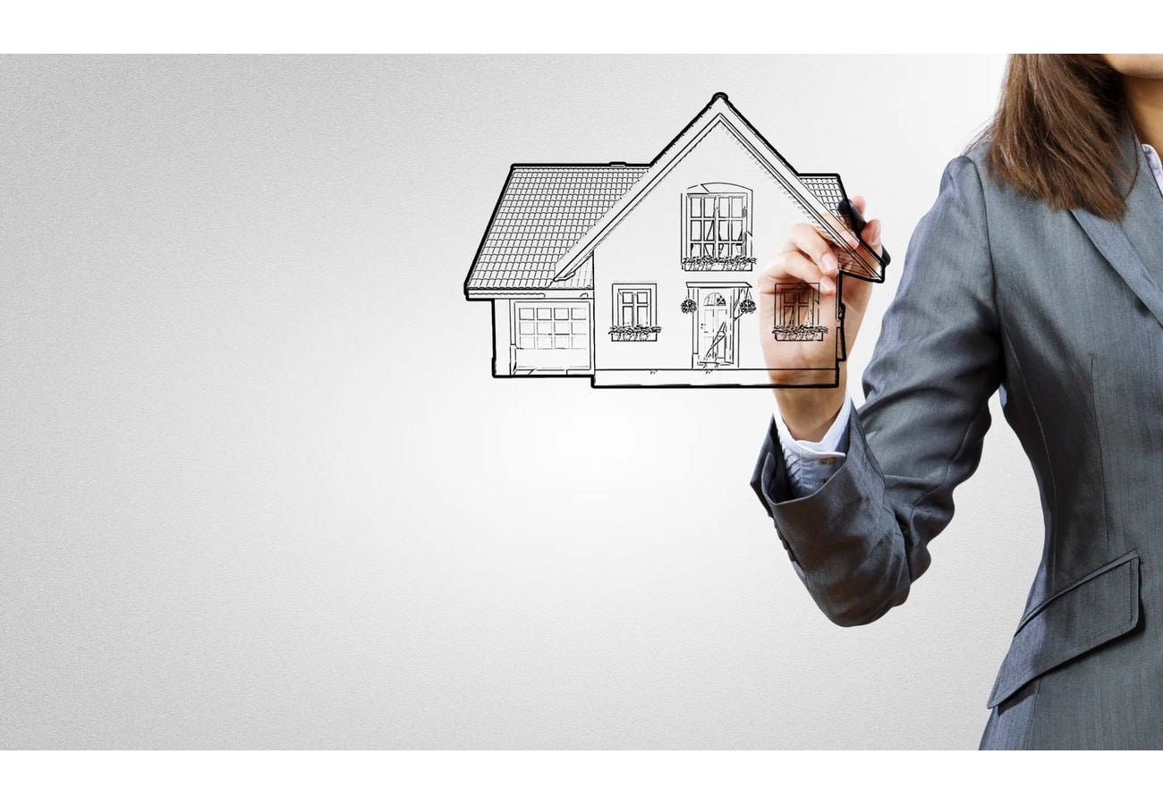 Denver real estate agent presenting a home illustration to represent property buying and selling services.