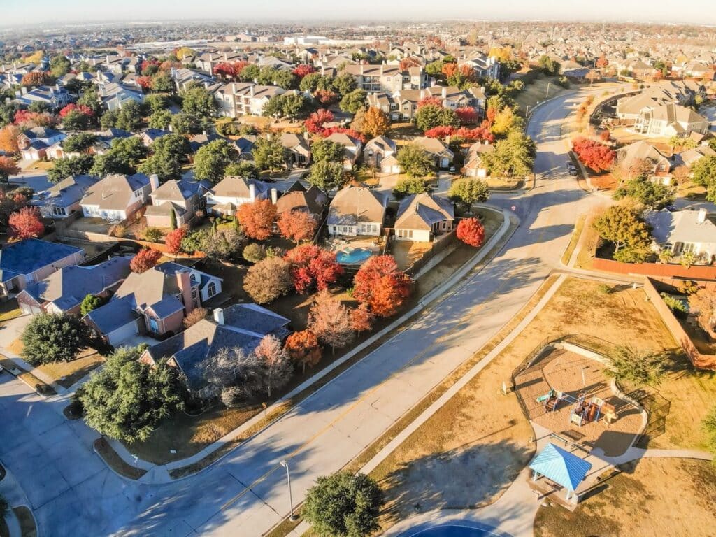 Aerial view of homes and tree-lined streets in one of the best areas to live in Denver, Colorado.